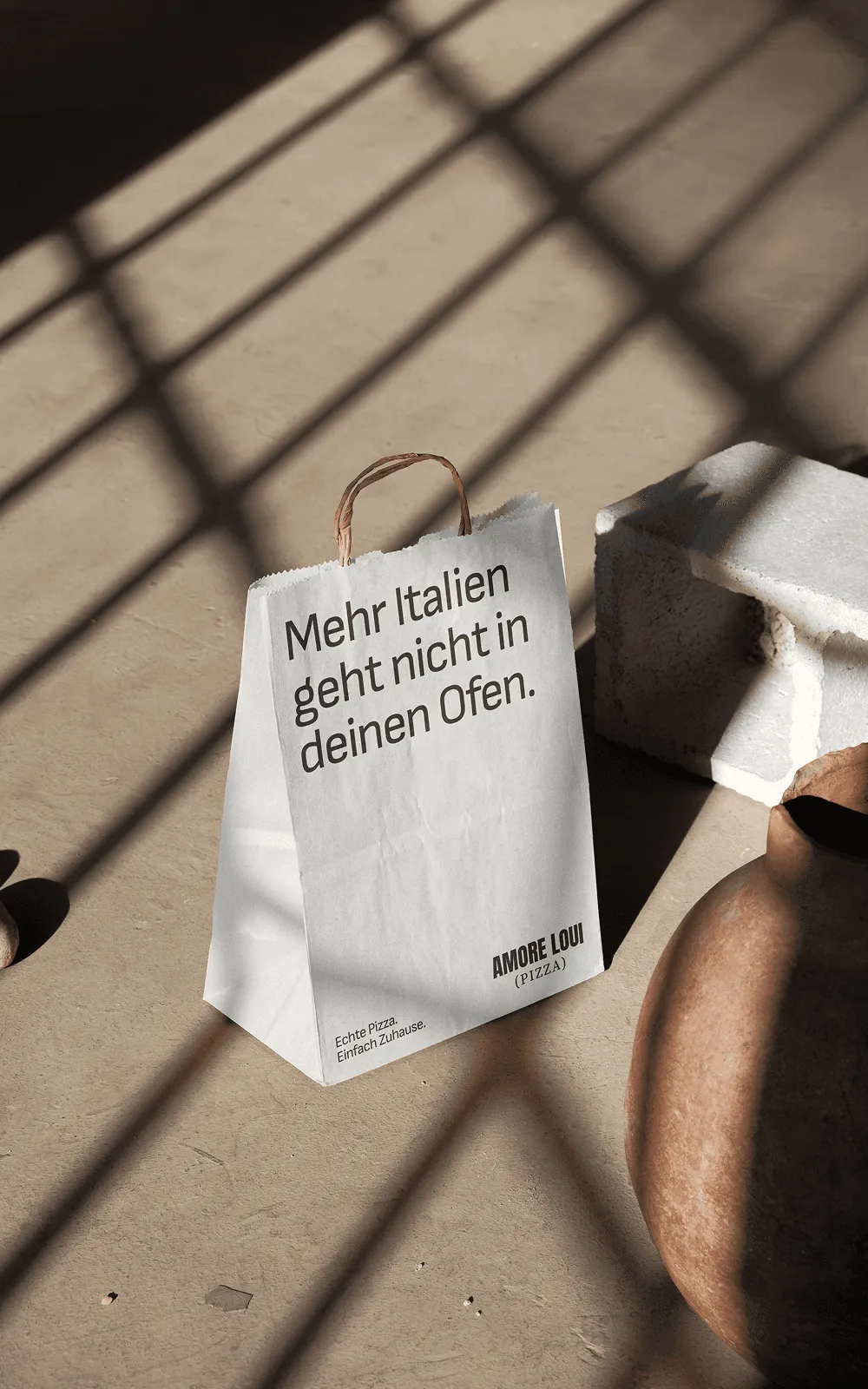 Amore Loui Papiertüte mit der Zeile: Mehr Italien geht nicht in deinen Ofen.
